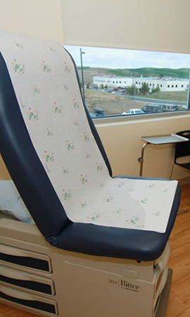 exam table in a paitent room